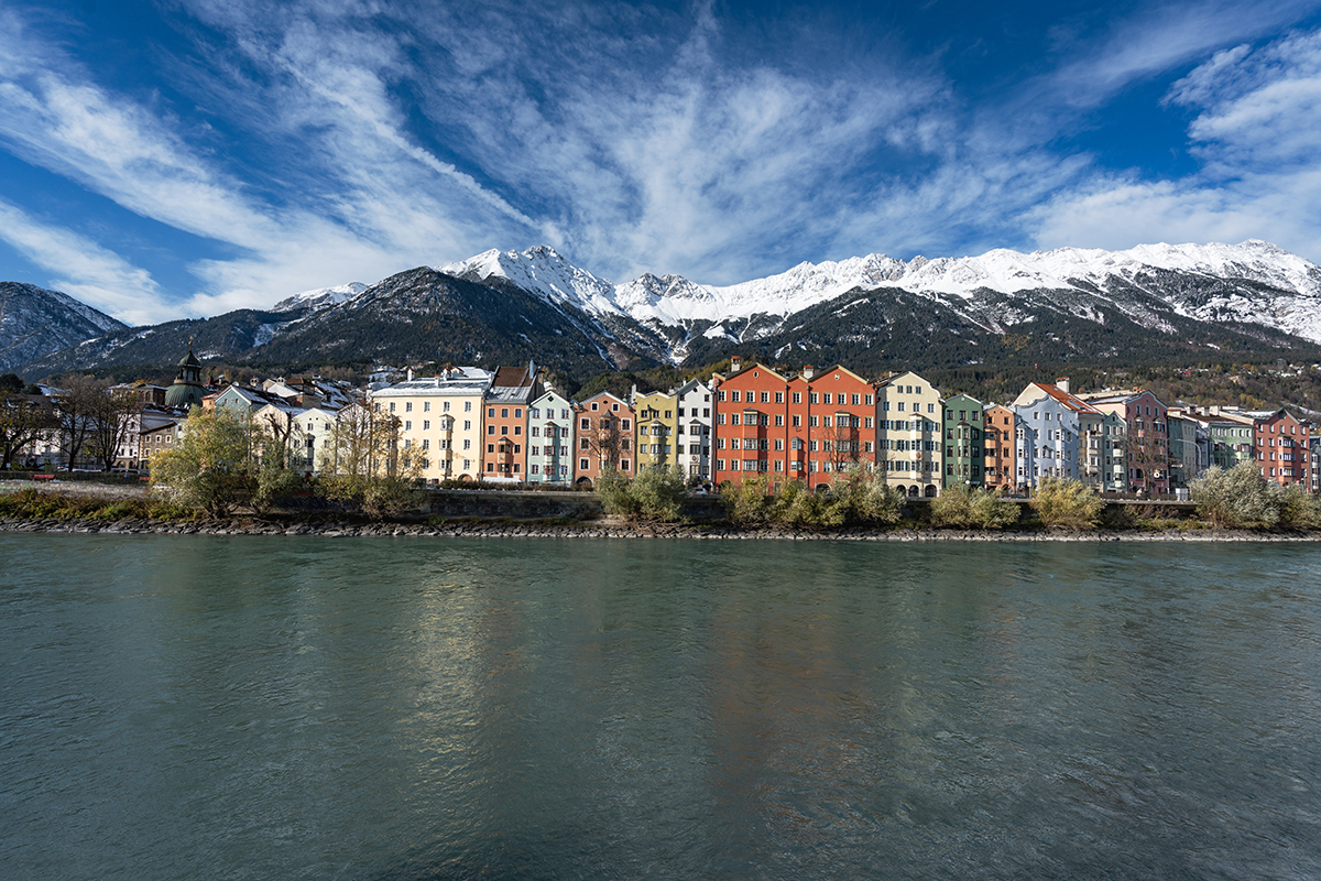 Austria Innsbruck - Beautiful Alpine cityscape with traditional Austrian architecture and mountains