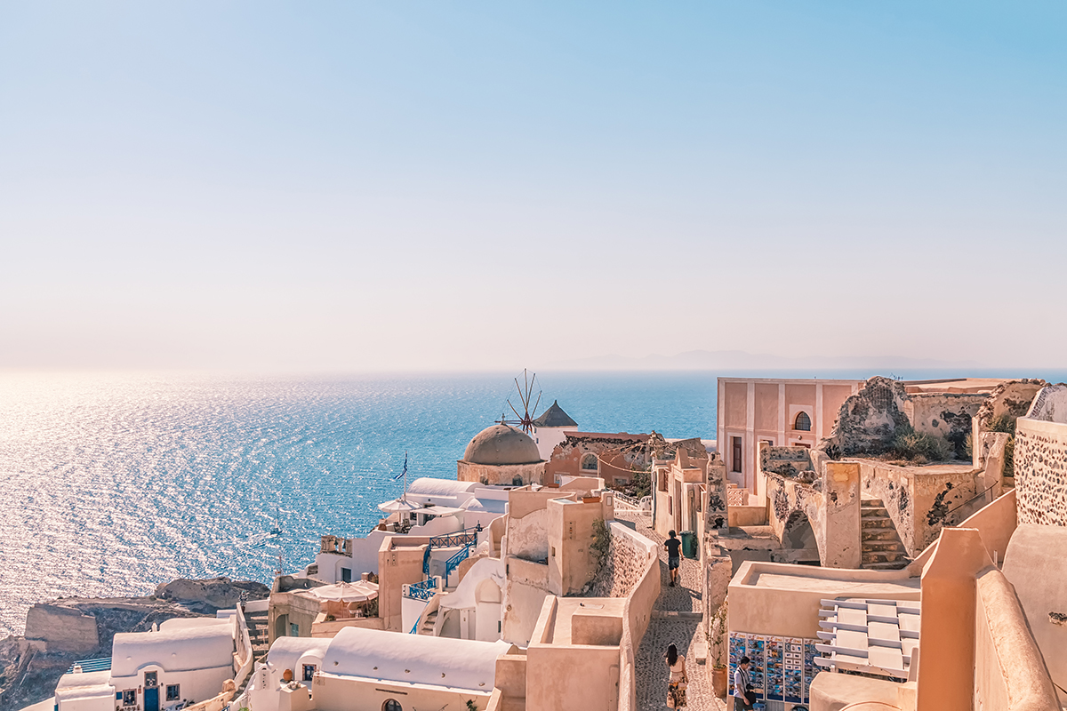 Santorini Greece - Iconic white and blue architecture overlooking the Aegean Sea